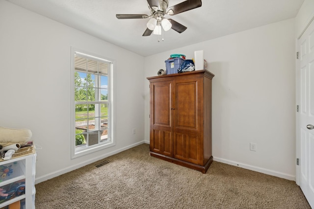 1809 Mosley Ferry Rd, Chapmansboro, TN 37035 - bedroom featuring baseboards, carpet, and a ceiling fan