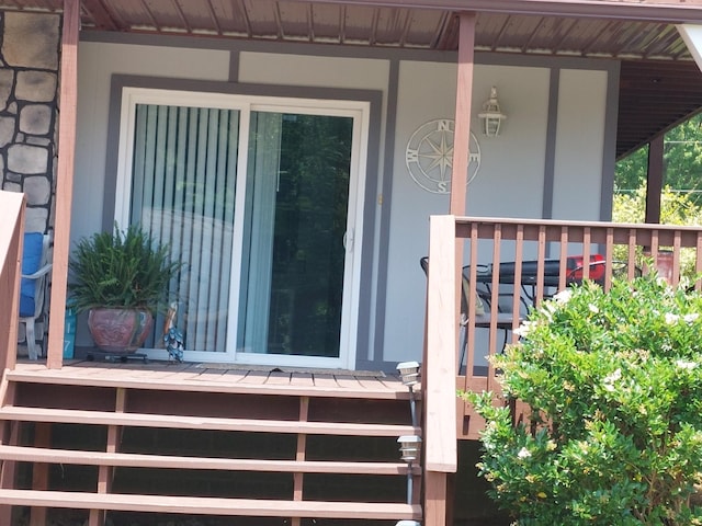 117 Sparrow Ln, Dover, TN 37058 - doorway to property featuring covered porch and stone siding