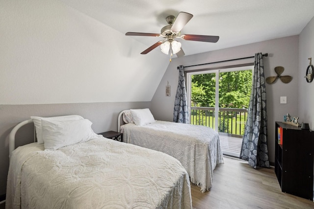 117 Sparrow Ln, Dover, TN 37058 - bedroom featuring access to outside, wood finished floors, lofted ceiling, and a ceiling fan