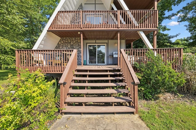 117 Sparrow Ln, Dover, TN 37058 - property entrance with stone siding and a deck