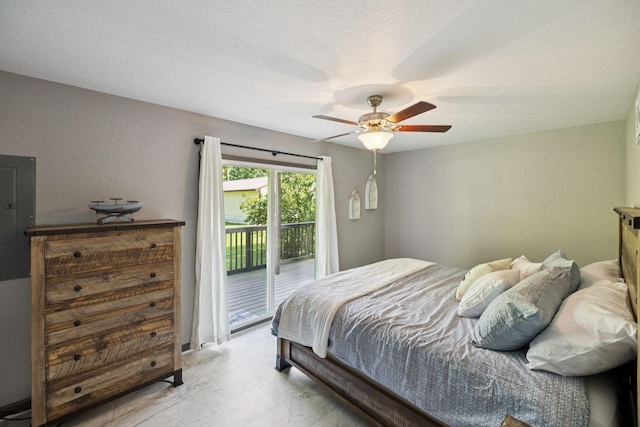 117 Sparrow Ln, Dover, TN 37058 - bedroom with access to exterior, ceiling fan, electric panel, and marble look tile flooring