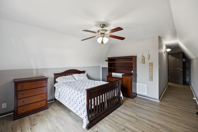 117 Sparrow Ln, Dover, TN 37058 - bedroom featuring wood finished floors, vaulted ceiling, and ceiling fan