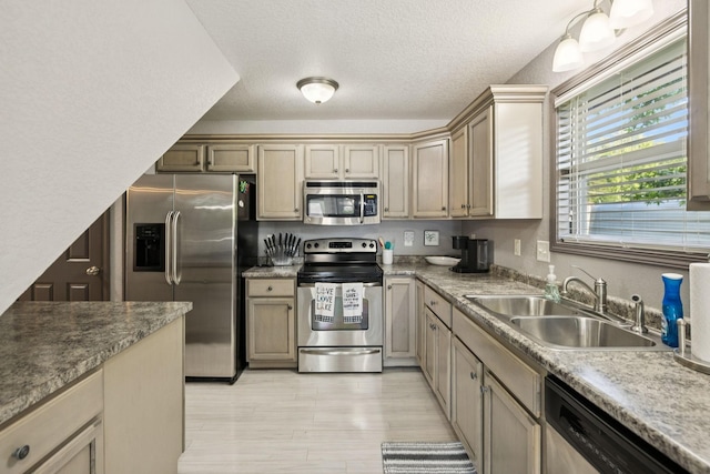 117 Sparrow Ln, Dover, TN 37058 - kitchen featuring appliances with stainless steel finishes and a textured ceiling