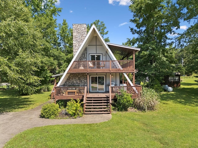 117 Sparrow Ln, Dover, TN 37058 - a-frame home featuring a chimney, a front yard, and a deck