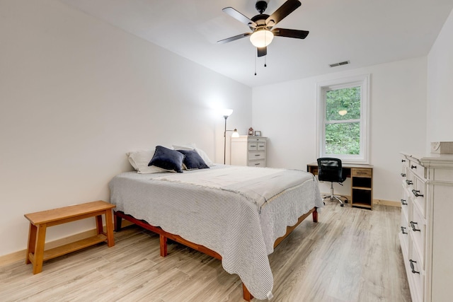 7872 Oscar Green Rd, Primm Springs, TN 38476 - bedroom with light wood finished floors, a desk, ceiling fan, and baseboards