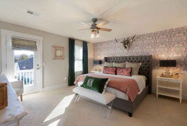3309 Longstalk Rd, Antioch, TN 37013 - bedroom featuring wallpapered walls, multiple windows, access to outside, light carpet, and baseboards
