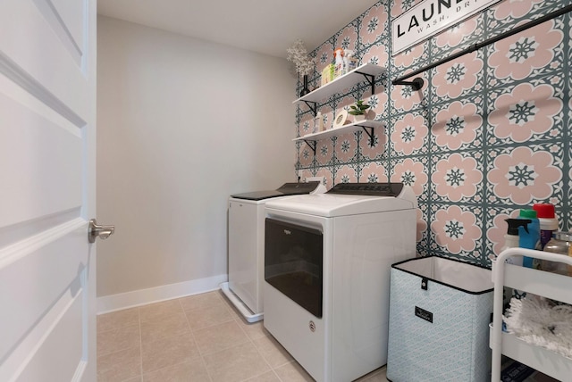 3309 Longstalk Rd, Antioch, TN 37013 - laundry room featuring separate washer and dryer, light tile patterned floors, and baseboards