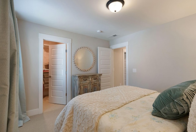 3309 Longstalk Rd, Antioch, TN 37013 - bedroom with light colored carpet, a walk in closet, and baseboards