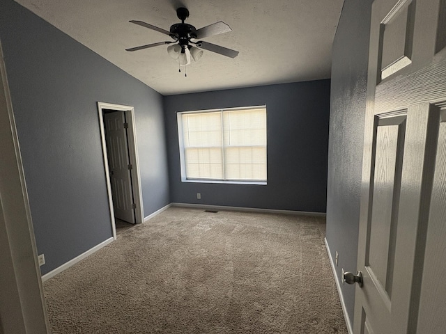 3236 Prater Ct, Murfreesboro, TN 37128 - unfurnished bedroom with carpet flooring, baseboards, vaulted ceiling, and a ceiling fan