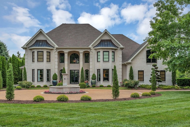 238 Pelham Dr, Brentwood, TN 37027 - french country style house with a front lawn and french doors