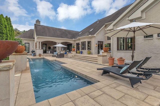 238 Pelham Dr, Brentwood, TN 37027 - swimming pool with an outdoor living space and a patio area