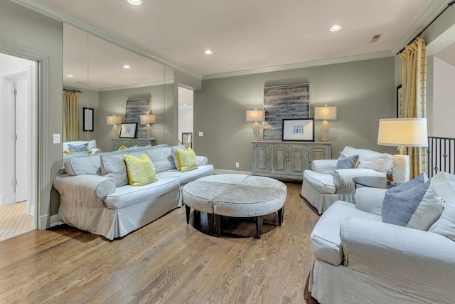 238 Pelham Dr, Brentwood, TN 37027 - living area with wood finished floors, ornamental molding, recessed lighting, and baseboards