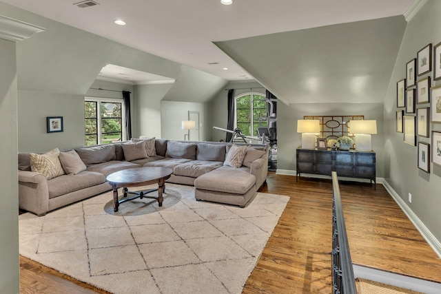 238 Pelham Dr, Brentwood, TN 37027 - living area with wood finished floors, lofted ceiling, baseboards, recessed lighting, and ornamental molding