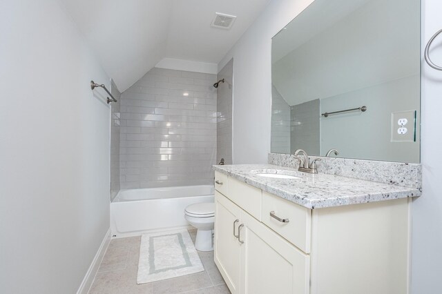 130 Allen Rd, Goodlettsville, TN 37072 - bathroom featuring lofted ceiling, vanity, toilet, washtub / shower combination, and tile patterned flooring