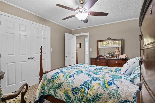 210 Lankford St, Bruceton, TN 38317 - carpeted bedroom with a textured ceiling, a closet, ceiling fan, and ornamental molding