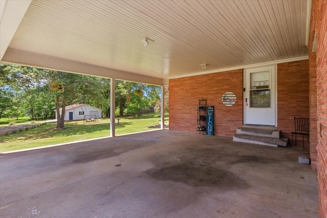 210 Lankford St, Bruceton, TN 38317 - view of patio with entry steps and a carport