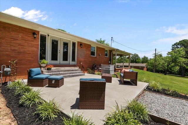 210 Lankford St, Bruceton, TN 38317 - view of patio with french doors, outdoor lounge area, and central AC