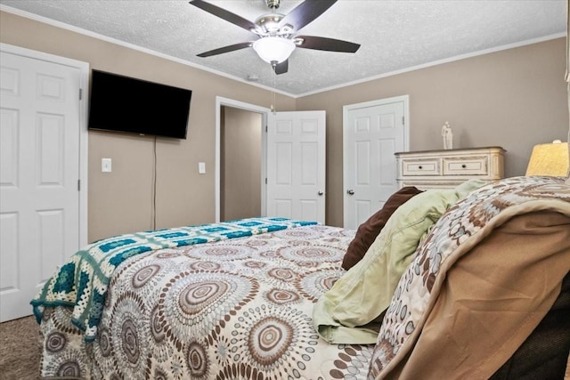 210 Lankford St, Bruceton, TN 38317 - bedroom featuring a textured ceiling, ceiling fan, ornamental molding, and carpet flooring