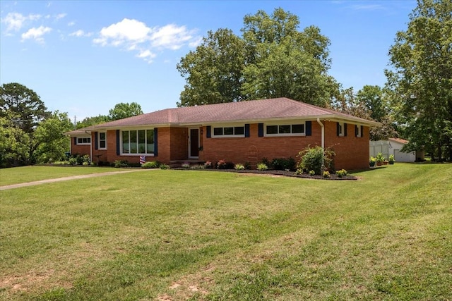 210 Lankford St, Bruceton, TN 38317 - single story home with a front yard and brick siding