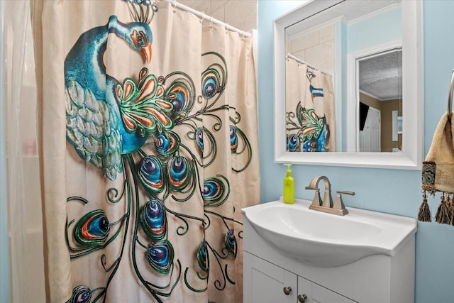 210 Lankford St, Bruceton, TN 38317 - full bath with crown molding, vanity, a textured ceiling, and a shower with shower curtain