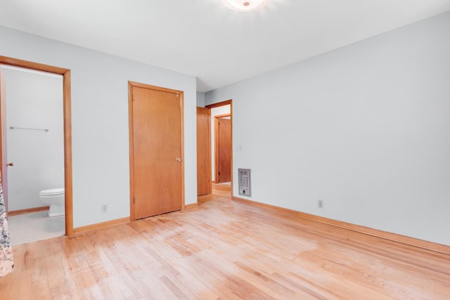 7111 Harrison Dr, Fairview, TN 37062 - unfurnished bedroom featuring light wood-style floors, a closet, and ensuite bath