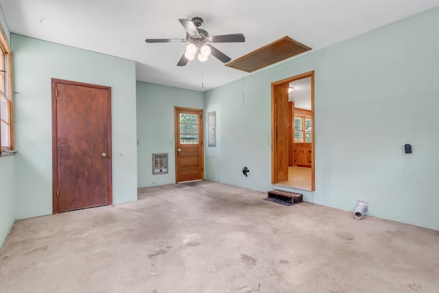 7111 Harrison Dr, Fairview, TN 37062 - unfurnished room featuring plenty of natural light, ceiling fan, and concrete flooring