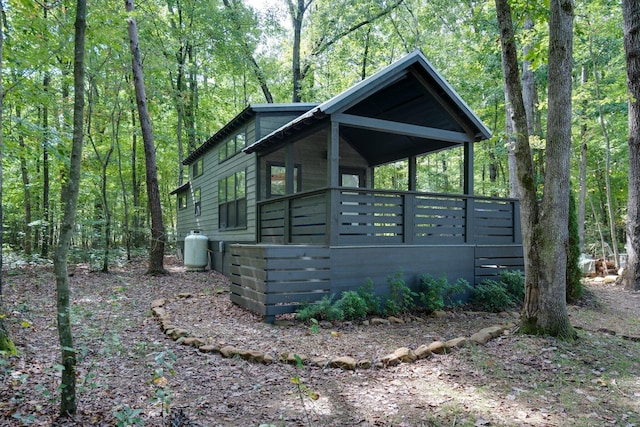 75 Deer Lick Trl, Monteagle, TN 37356 - view of property exterior featuring a wooded view and a porch