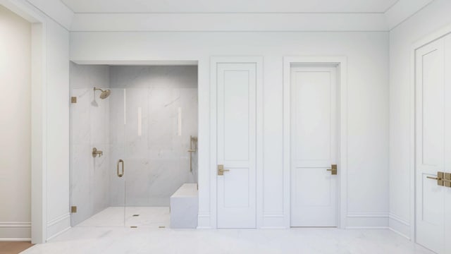 1316 Mcquiddy Rd, Nashville, TN 37221 - full bathroom with a marble finish shower and baseboards