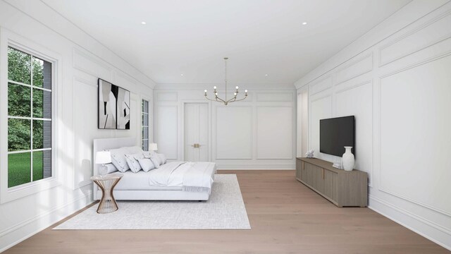 1316 Mcquiddy Rd, Nashville, TN 37221 - bedroom with a decorative wall, a chandelier, and light wood-style floors