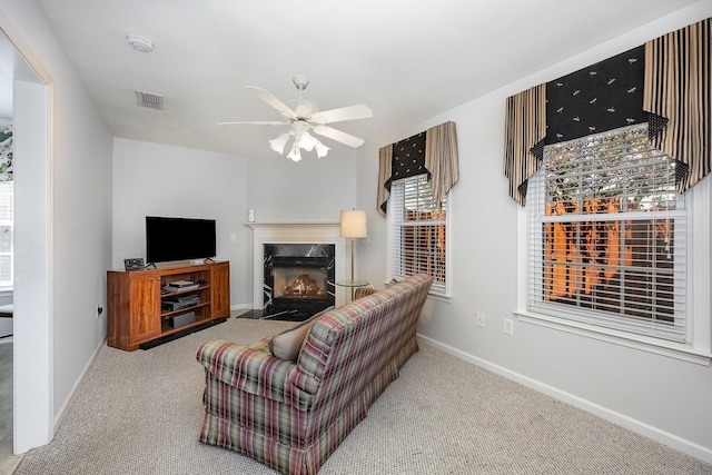 646 Forest Glen Cir, Murfreesboro, TN 37128 - carpeted living room with a high end fireplace, baseboards, and ceiling fan