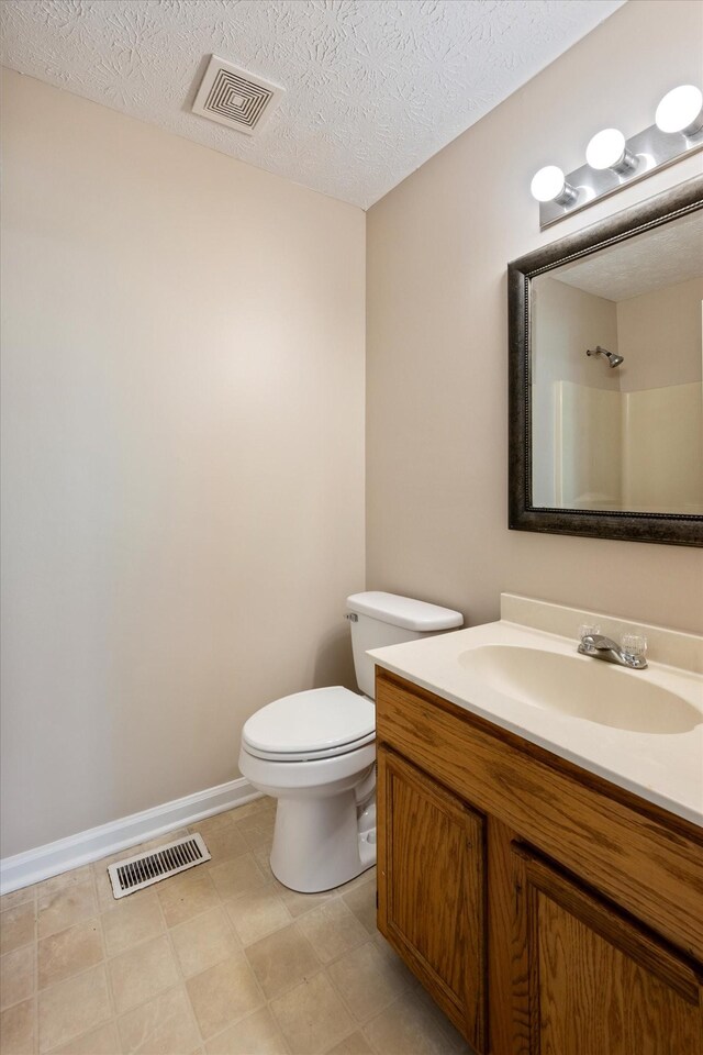 104 Hillcreek Ct, Portland, TN 37148 - bathroom with toilet, vanity, and baseboards