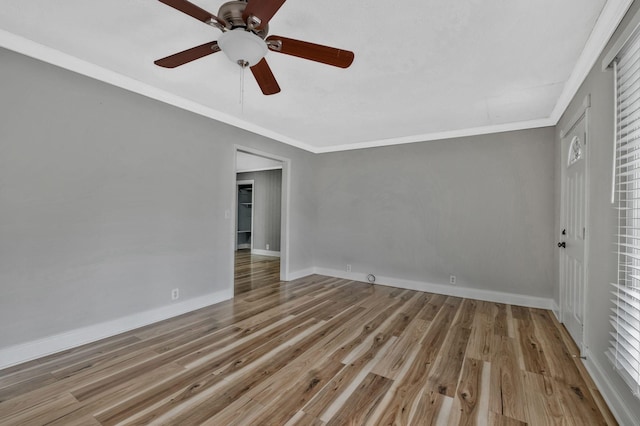 101 Walnut St, Smyrna, TN 37167 - spare room featuring ceiling fan, crown molding, baseboards, and wood finished floors