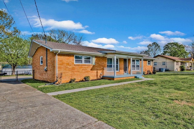 101 Walnut St, Smyrna, TN 37167 - ranch-style house featuring covered porch, brick siding, a gate, and roof with shingles