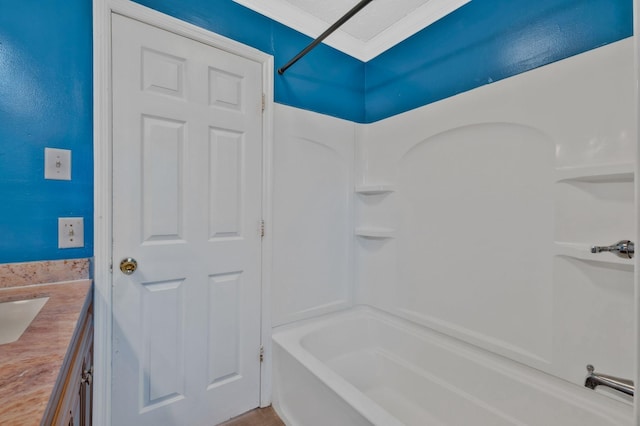 101 Walnut St, Smyrna, TN 37167 - bathroom featuring ornamental molding, vanity, and tub / shower combination