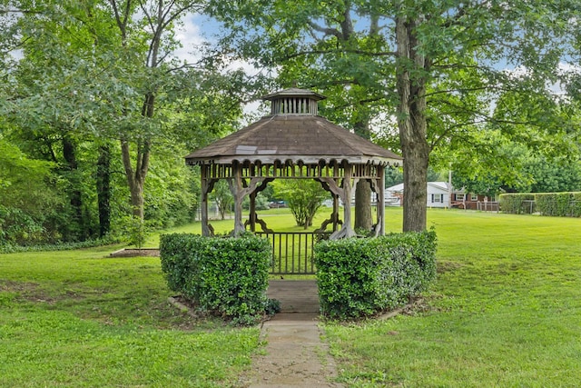 414 Ashe Ave, New Johnsonville, TN 37134 - surrounding community featuring a gazebo and a lawn
