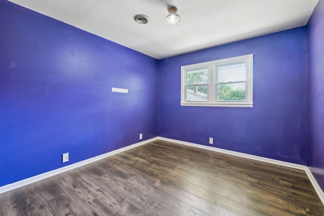 414 Ashe Ave, New Johnsonville, TN 37134 - unfurnished room with baseboards and wood finished floors