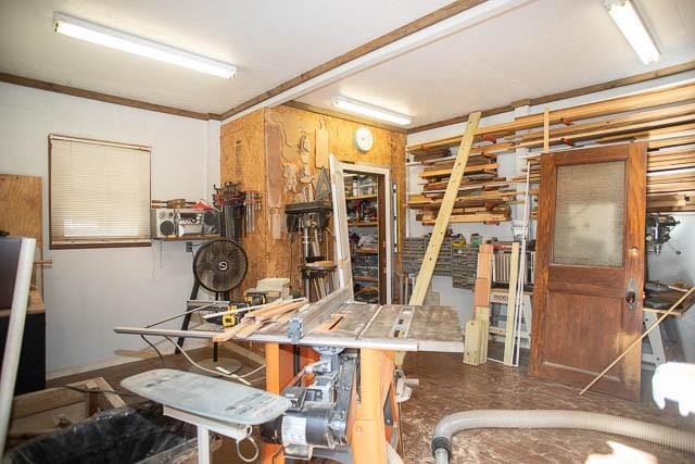 6684 Eudailey Covington Rd, College Grove, TN 37046 - misc room featuring a workshop area