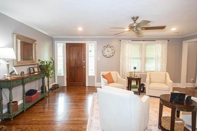 6684 Eudailey Covington Rd, College Grove, TN 37046 - living room featuring wood finished floors, ornamental molding, a ceiling fan, and baseboards