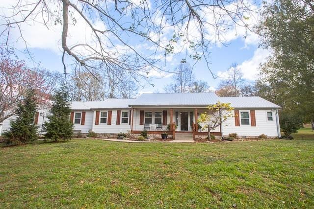 6684 Eudailey Covington Rd, College Grove, TN 37046 - single story home featuring covered porch and a front lawn