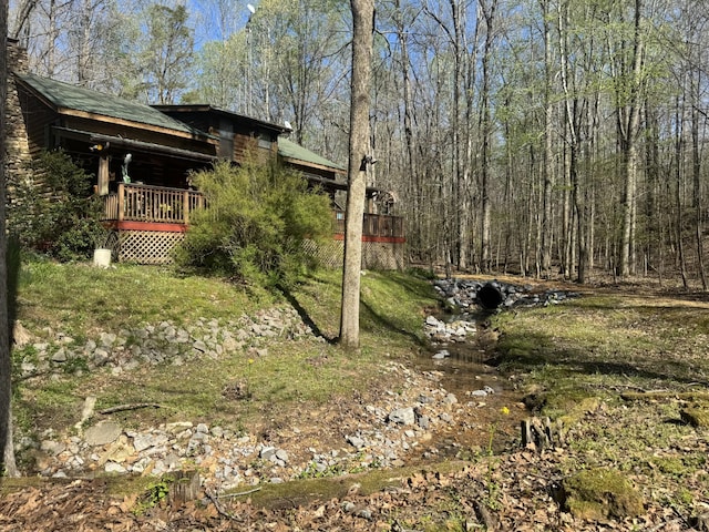 268 Sugar Maple Dr, Dover, TN 37058 - view of yard with a deck and a forest view