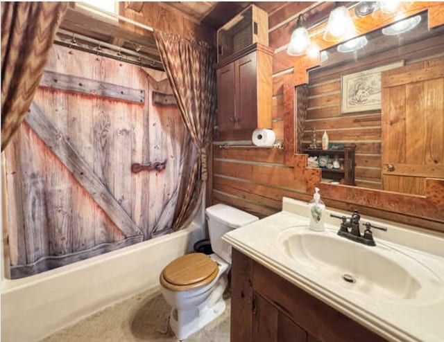 268 Sugar Maple Dr, Dover, TN 37058 - full bathroom with wood walls, vanity, toilet, and shower / bathtub combination with curtain