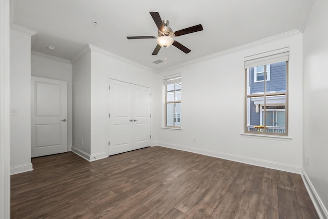1021 Vida Way Unit 202, Nolensville, TN 37135 - unfurnished bedroom with dark wood-type flooring, baseboards, a closet, crown molding, and ceiling fan
