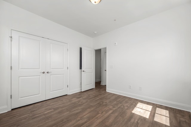 1021 Vida Way Unit 202, Nolensville, TN 37135 - unfurnished bedroom with wood finished floors, baseboards, and a closet