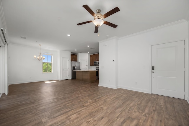 1021 Vida Way Unit 202, Nolensville, TN 37135 - unfurnished living room featuring a chandelier, a ceiling fan, dark wood-style flooring, baseboards, and crown molding