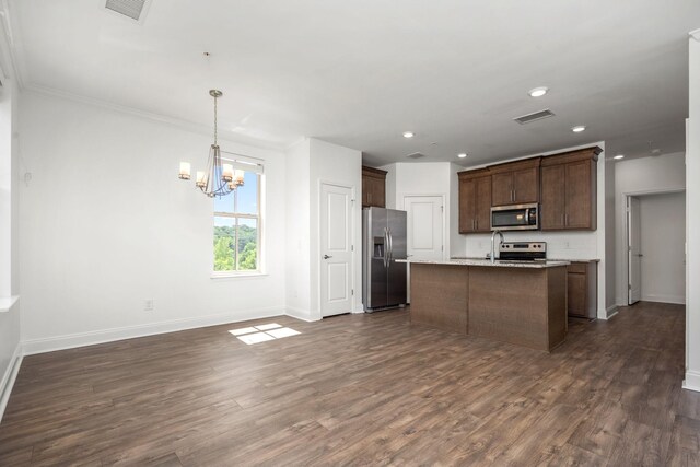 1021 Vida Way Unit 202, Nolensville, TN 37135 - kitchen featuring appliances with stainless steel finishes, a chandelier, baseboards, open floor plan, and recessed lighting