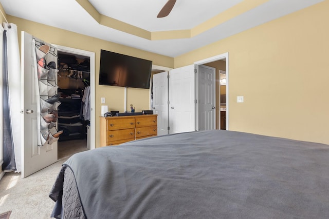 221 Pitts Ave, Old Hickory, TN 37138 - bedroom with carpet floors, a walk in closet, a raised ceiling, a ceiling fan, and a closet