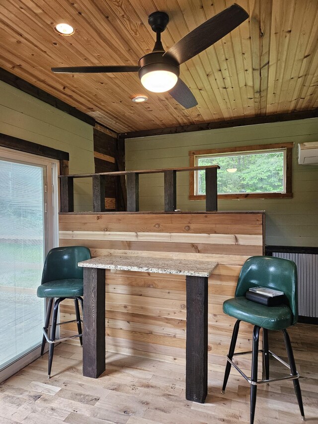 200 Caney Bend Rd, Doyle, TN 38559 - bar with wood ceiling, a wall mounted AC, wooden walls, radiator, and a ceiling fan
