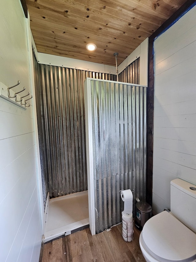 200 Caney Bend Rd, Doyle, TN 38559 - full bathroom featuring wood ceiling, wood finished floors, a shower stall, toilet, and wooden walls