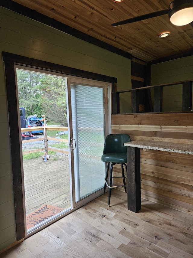 200 Caney Bend Rd, Doyle, TN 38559 - doorway to outside with wooden ceiling, wood walls, and light wood-style flooring