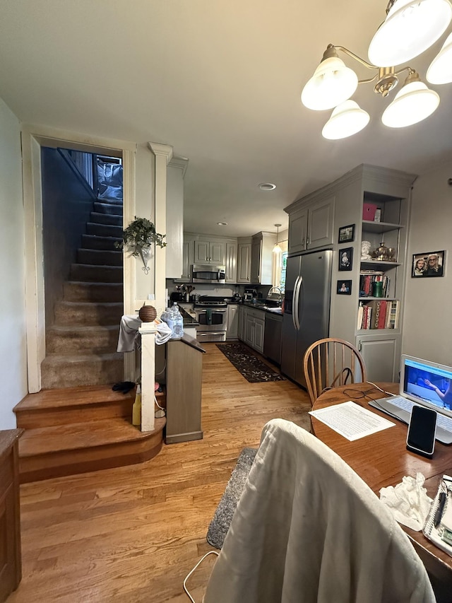 3508 General Bate Dr, Nashville, TN 37204 - dining area with light wood finished floors and stairway